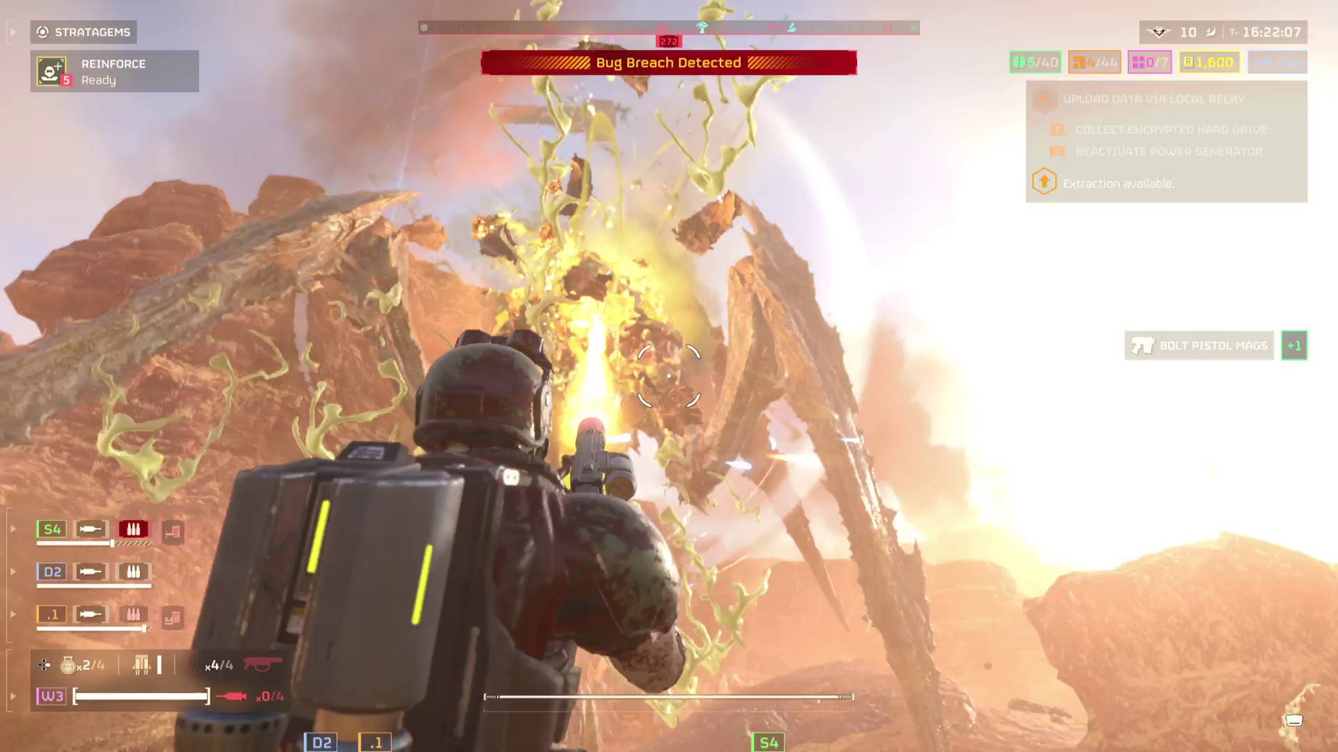 Helldivers 2 player firing meltagun from Warhammer 40K Warbond at bile titan's head, causing it to explode