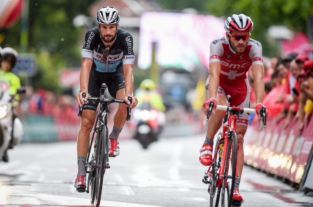 Tom Boonen (Etixx-QuickStep) and Danilo Wyss (BMC) cross the line together
