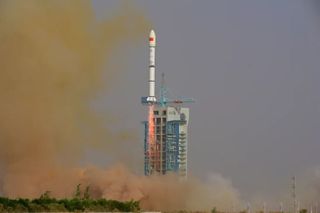 A Long March 2C rocket lifts off from China's Jiuquan Satellite Launch Center in the Gobi Desert on May 20, 2022, carrying three communications test satellites.