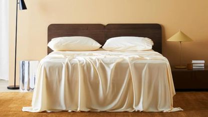 Ettitude bamboo bedding in butter yellow photographed in a similarly shaded yellow-tinged bedroom