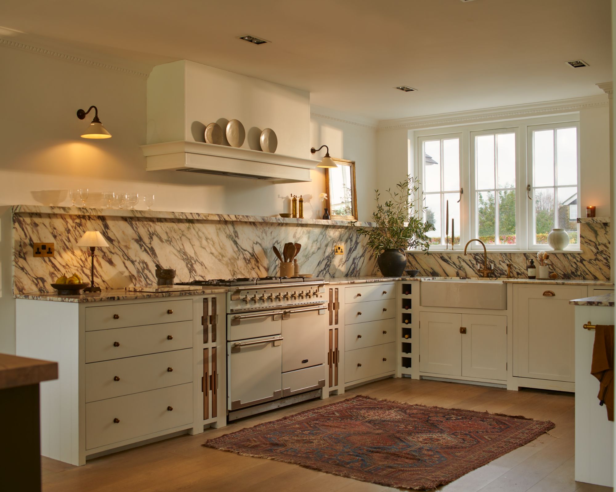 A marbled splashback and countertop kitchen