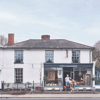 exterior of georgian cottage with antique's shop