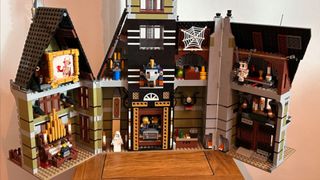 LEGO Haunted House interior on a wooden table