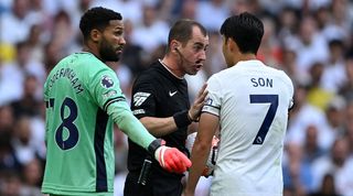 Sheffield United's Wes Foderingham and Tottenham's Son Heung-min speak to the referee during the teams' Premier League clash in north London in September 2023.