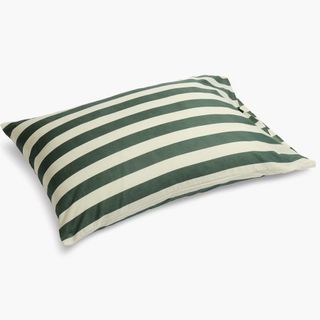 A green and white striped pillowcase