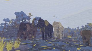 Three elephants surrounded by blue trees