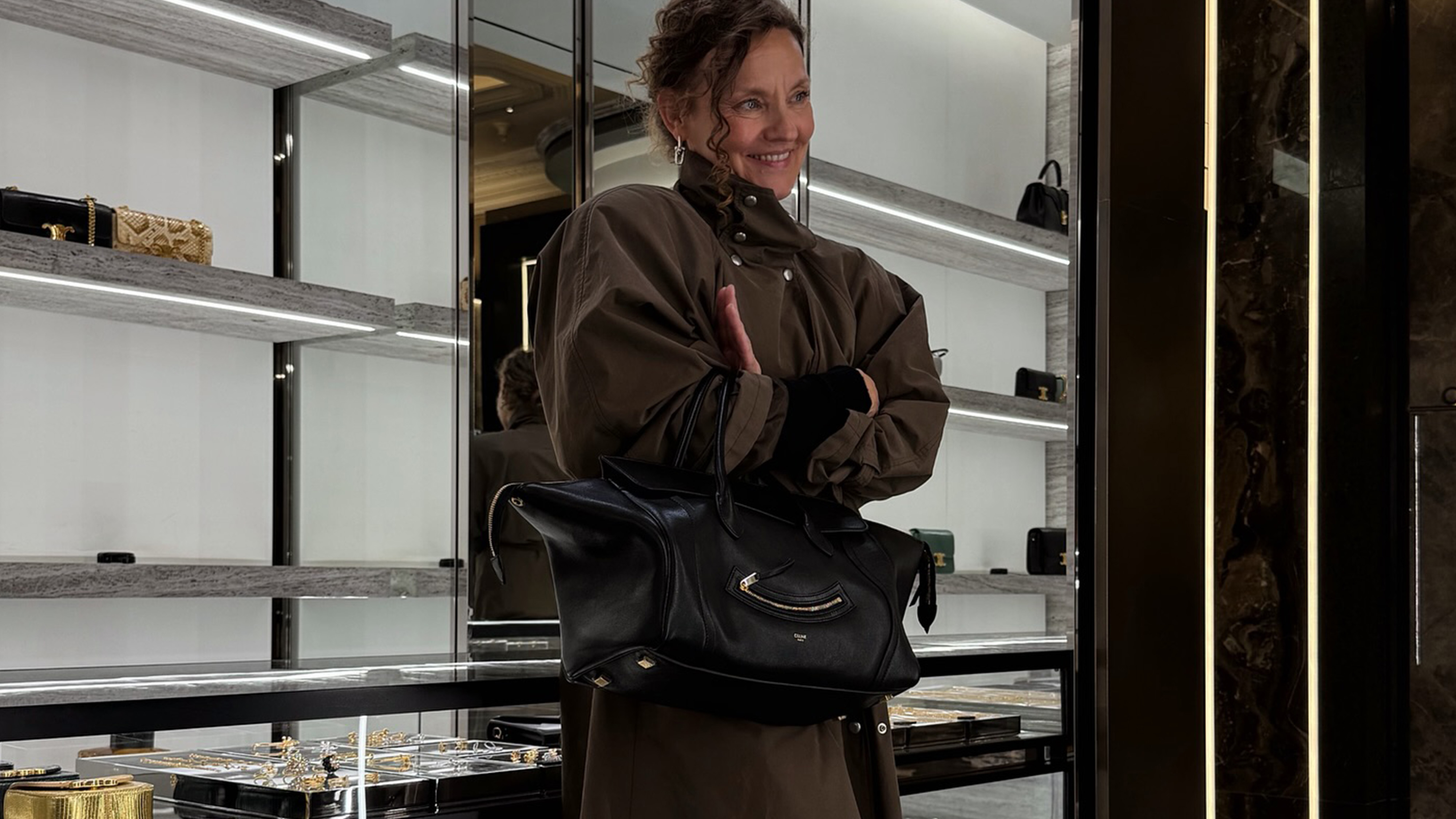 renia jaz at harrods trying on a celine bag