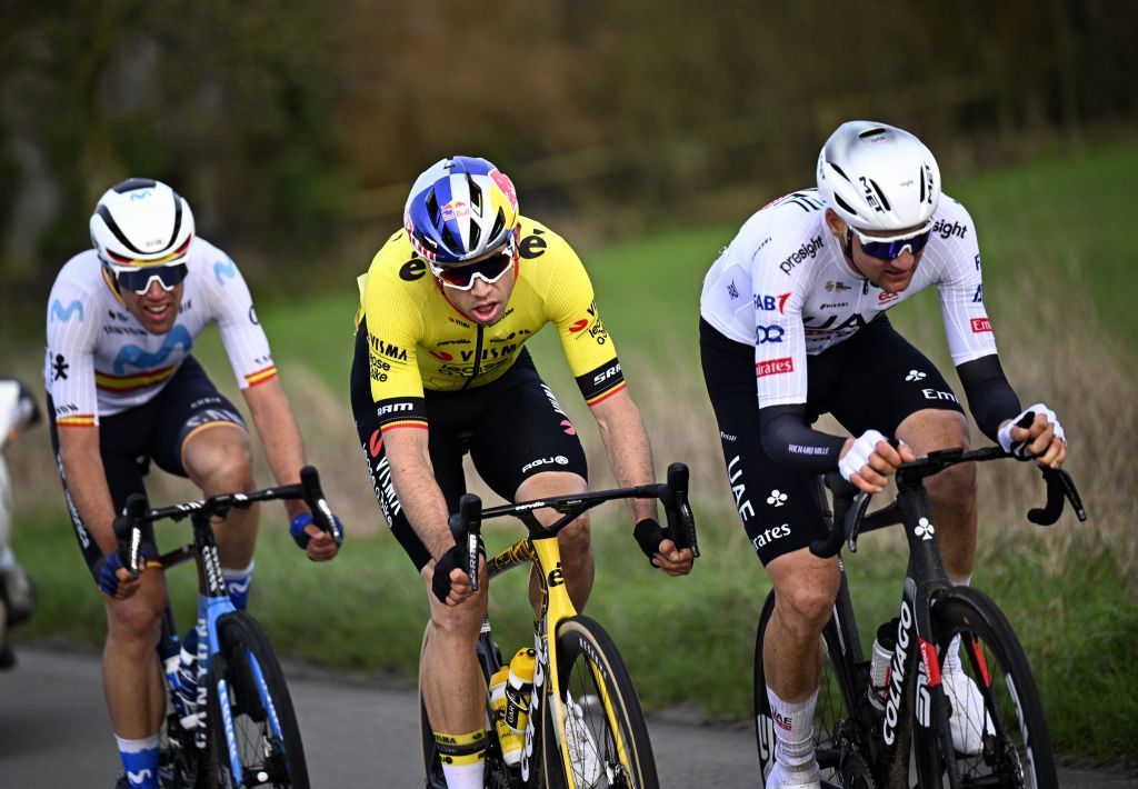 from left: Belgian Wout van Aert of Team Visma-Lease a Bike, Belgian Tim Wellens of UAE Team Emirates and Spanish Oier Lazkano of Movistar Team, compete during the Kuurne-Brussels-Kuurne one day cycling race, 196,4 km from Kuurne to Kuurne via Brussels, in Kortrijk on February 25, 2024. (Photo by JASPER JACOBS / Belga / AFP) / Belgium OUT