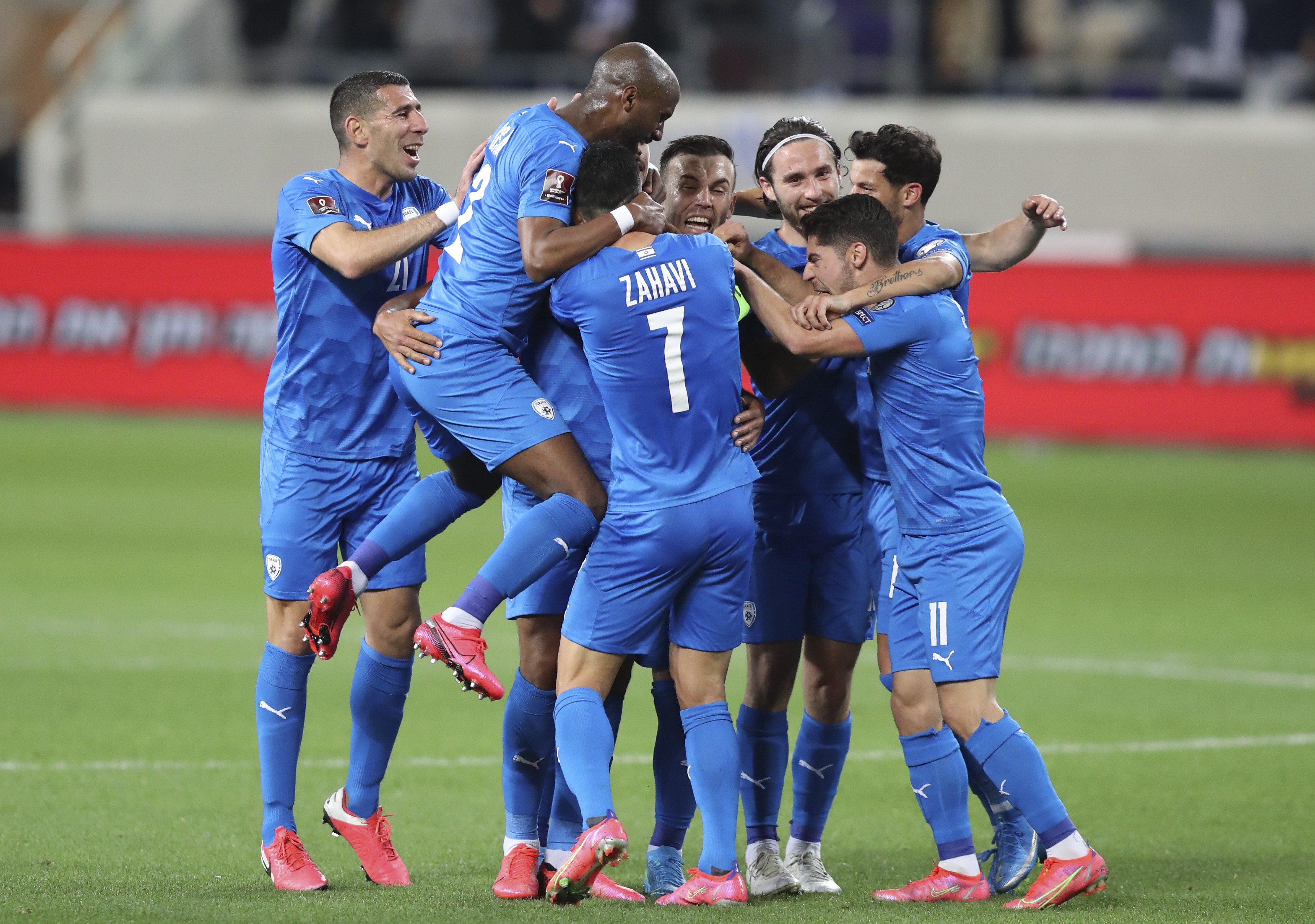 Israel celebrate Dor Peretz's opener in Tel Aviv