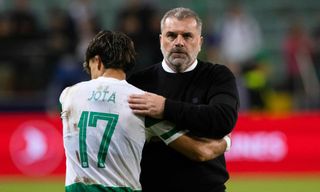 Celtic Manager Ange Postecoglou and Jota hug at full time during a UEFA Champions League match between FC Shakhtar Donetsk and Celtic at the Stadion Wojska Polskiego, on September 14, 2022, in Warsaw, Poland.