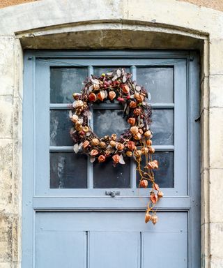 Vintage-style fall/Christmas door decor
