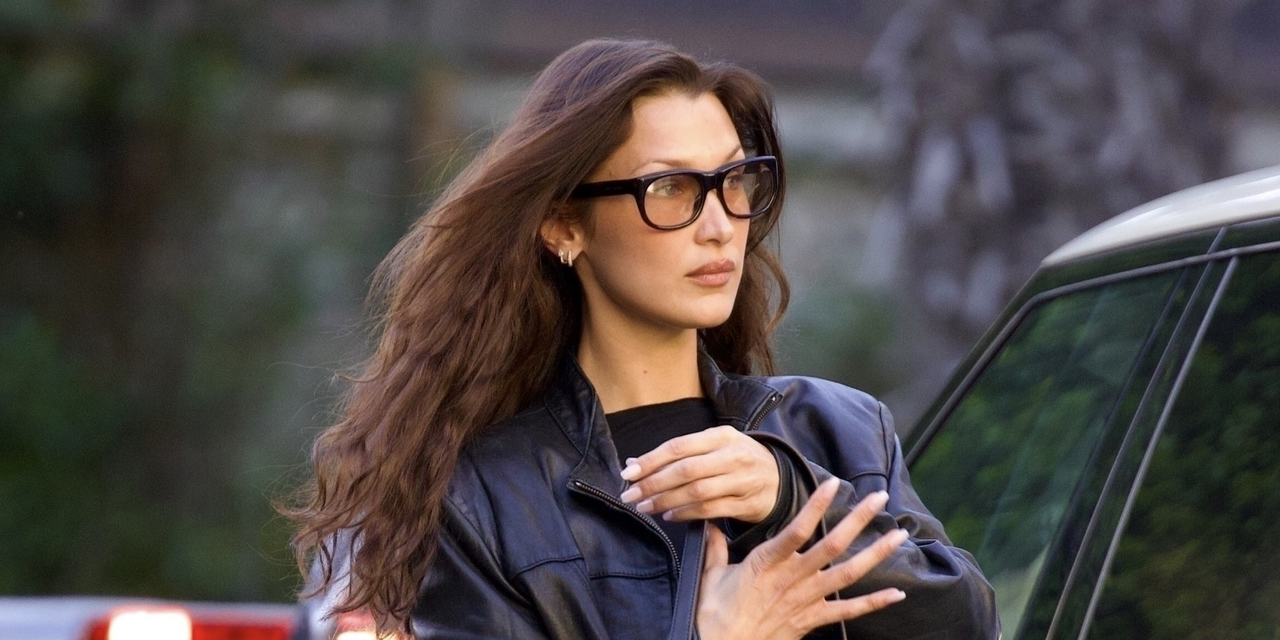 Bella Hadid was spotted out in Los Angeles on Tuesday afternoon looking perfectly stylish in a sleek fall ensemble. The model, fresh off of her surprise walk in the Victoria&#039;s Secret fashion show, was spotted leaving Chateau Marmont after a late afternoon meeting. She wore the perfect black leather jacket with a pair of washed grey jeans, a pair of glasses and a recycled leather Coachtopia bag.