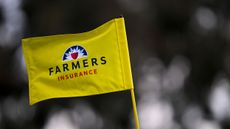 A general image of a yellow Farmers Insurance Open pin flag
