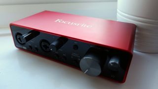 Focusrite Scarlett 2i2 interface on a window sill