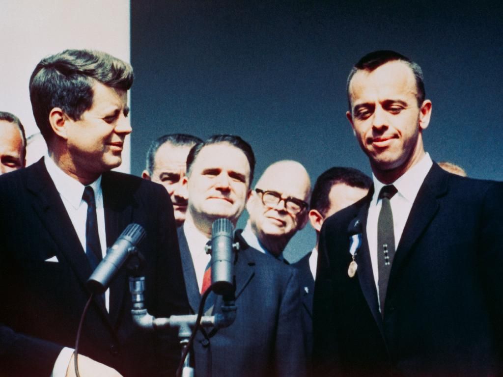 President John F. Kennedy presents astronaut Alan B. Shepard Jr. with NASA's Distinguished Service Medal Award in a Rose Garden ceremony on May 8, 1961, at the White House.