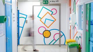 Hospital wall decorated with art by Supermundane