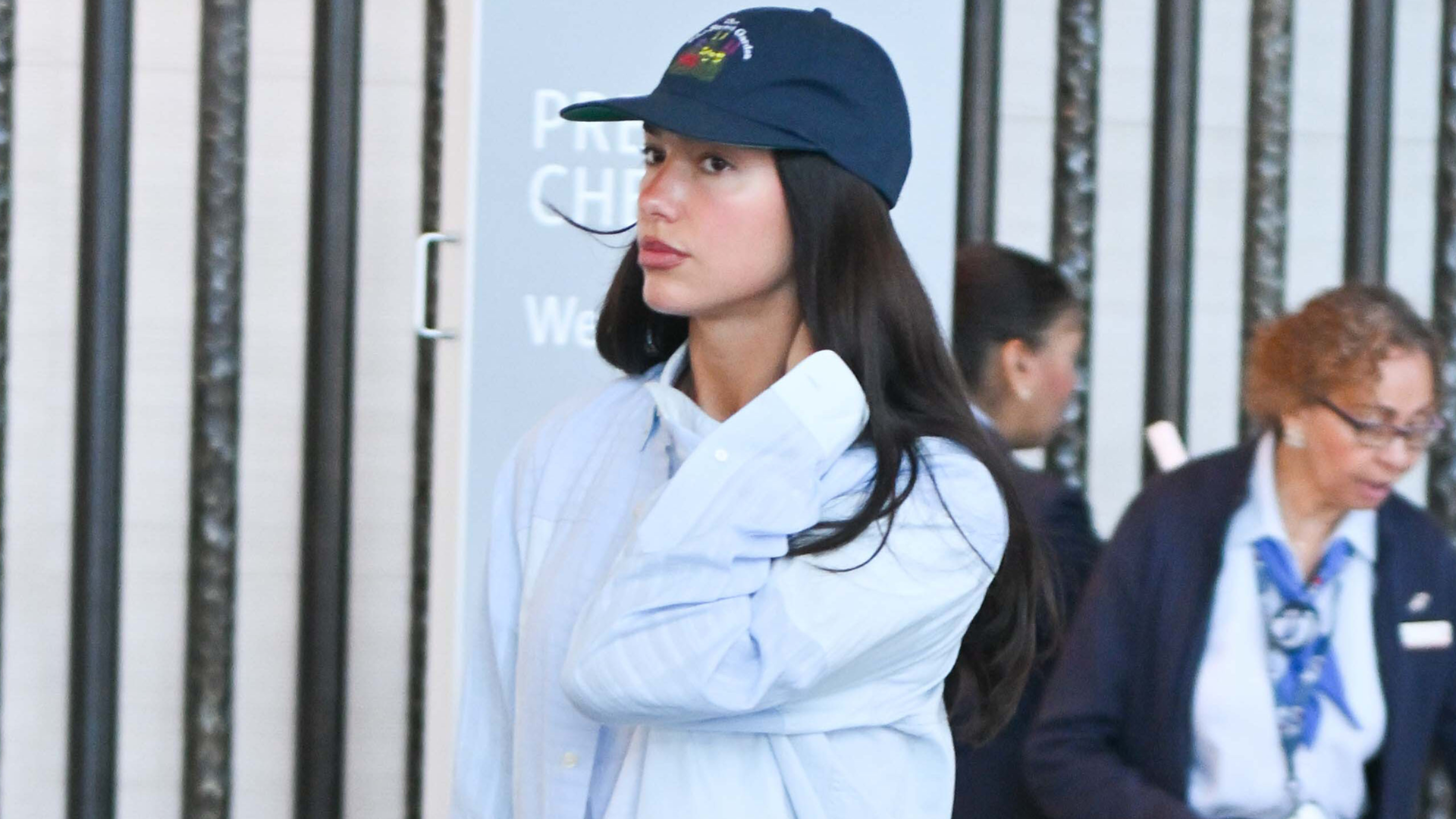 Dua Lipa styled her airport. outfit with summer 2026's straight-leg denim trend 