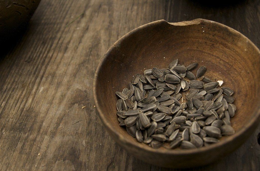 Wooden Bowl Of Sunflower Seeds