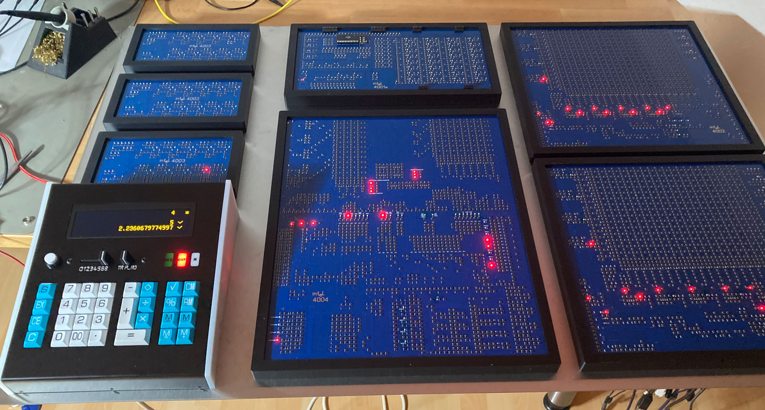 Supersized chip family gathers for the 54th anniversary of the Intel 4004 CPU — 4001 ROM, 4002 RAM, and 4003 shift registers feature in a reconstructed Busicom calculator build