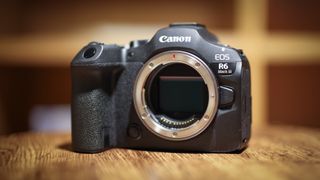 Canon EOS R6 Mark III against a wooden background