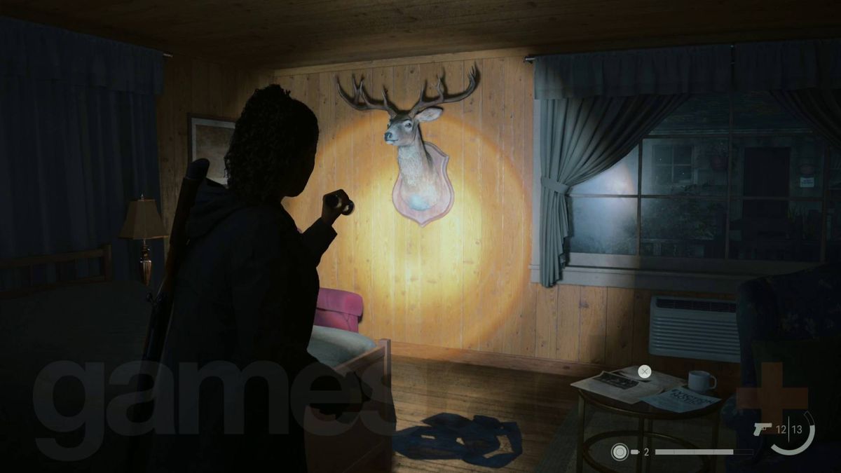 Alan Wake 2 deer head in cauldron lake rental cabin