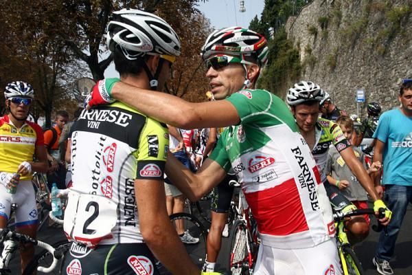Farnese Vini-Neri Sottoli teammates Oscar Gatto, left, and Giovanni Visconti celebrate the Italian champion's stage win.