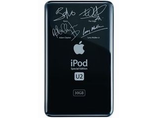 The flip side on the player shows autographs of each U2 band member on
