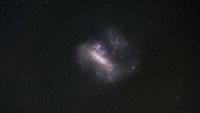 A telescope image of the Large Magellanic Cloud, a satellite galaxy orbiting the Milky Way that contains clues to the early composition of the universe.