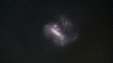A telescope image of the Large Magellanic Cloud, a satellite galaxy orbiting the Milky Way that contains clues to the early composition of the universe.