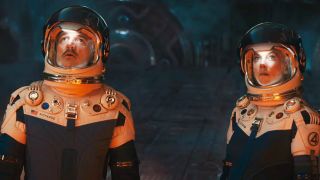 Reed Richards and Sue Storm wearing spacesuits and looking worried in The Fantastic Four: First Steps