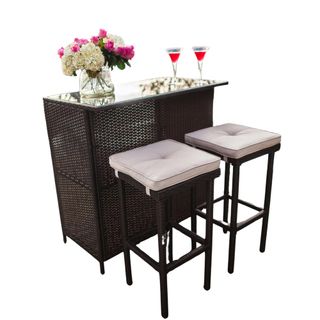 Small outdoor wicker bar with two stools