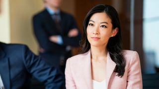 Arden Cho as Ingrid Yun in Partner Track on Netflix