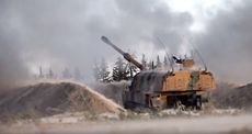 Turkish tanks fire on Syria