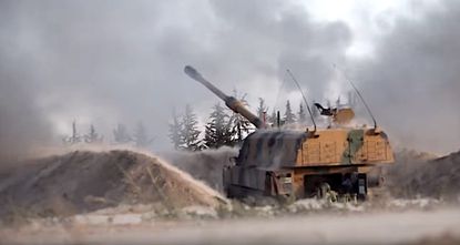 Turkish tanks fire on Syria