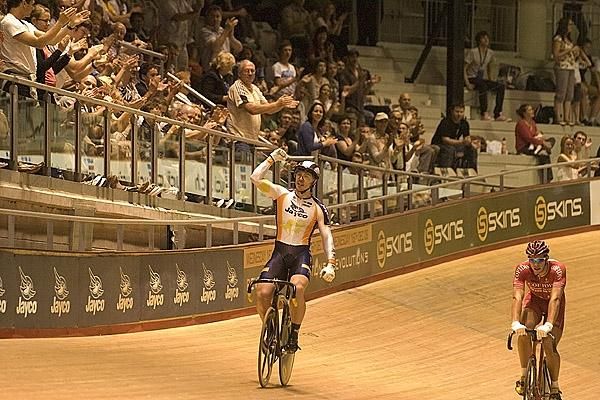 Shane Perkins of Australia celebrates his gold medal ride against Frenchman Kevin Sireau in the men's sprint.