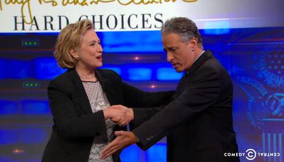 Jon Stewart ardently tries to get Hillary Clinton to declare her presidential run, kind of succeeds