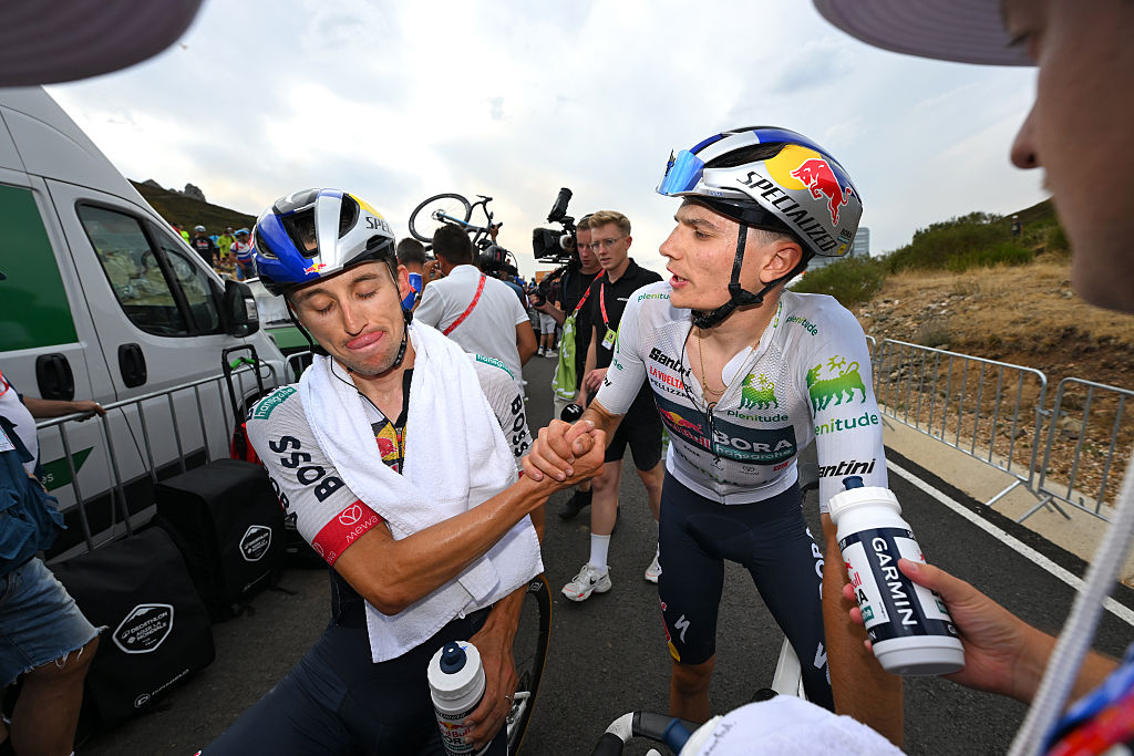 LA FARRAPONA. LAGOS DE SOMIEDO, SPAIN - SEPTEMBER 06: (L-R) Jai Hindley of Australia and TGiulio Pellizzari of Italy and Team Red Bull - BORA - hansgrohe - White Best Young Rider Jersey react after the La Vuelta - 80th Tour of Spain 2025, Stage 14 a 135.9km stage from Aviles to La Farrapona. Lagos de Somiedo 1711m / #UCIWT / on September 06, 2025 in La Farrapona. Lagos de Somiedo, Spain. (Photo by Tim de Waele/Getty Images)