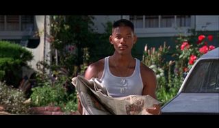 Independence Day Will Smith looks up from his paper