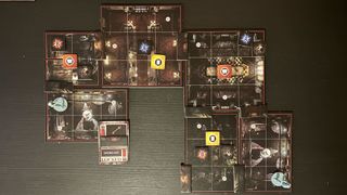 Resident Evil The Board Game map laid out on a black table