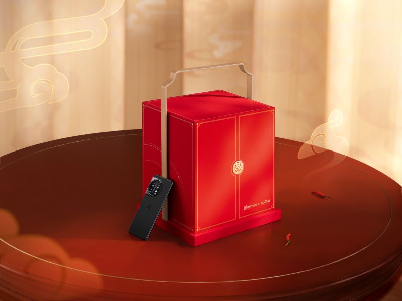 The OnePlus and Genshin Impact collaboration box in a fiery red.