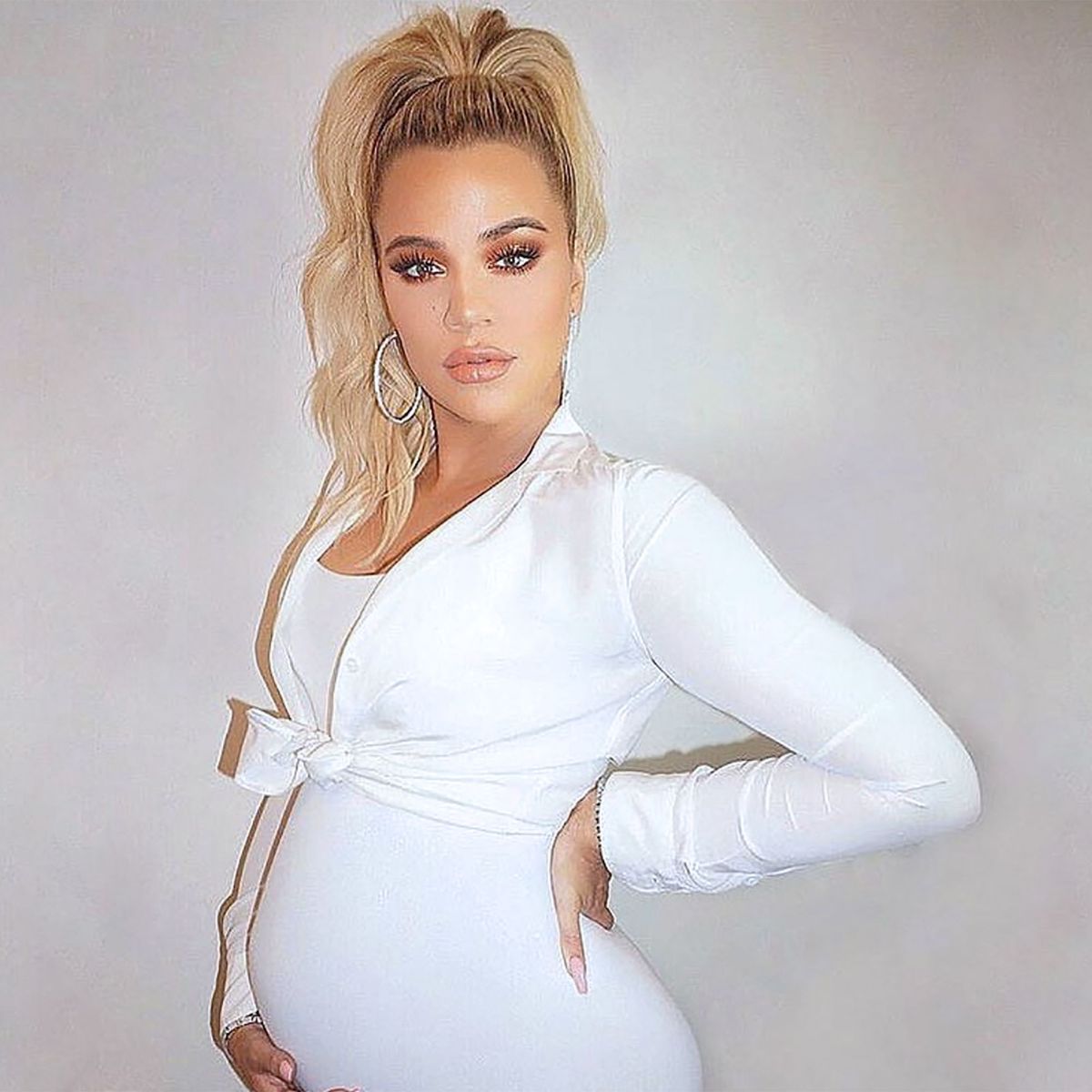 Khloé Kardashian Asks Twitter a Question About Her Growing Baby Bump