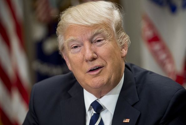 Trump speaks to educators in the Roosevelt Room of the White House.