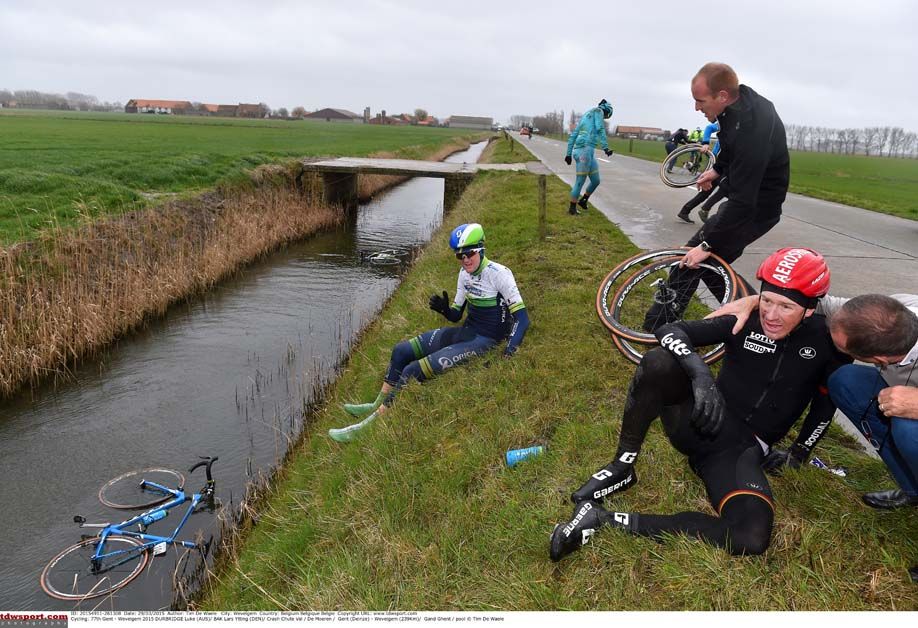 Riders gather themselves after a crash at Gent-Wevelgem