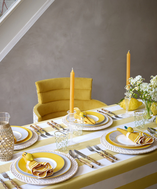 yellow and white themed spring dining table
