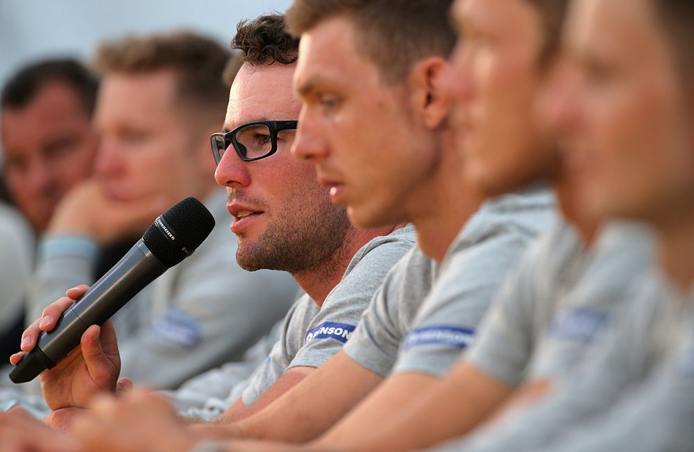 It takes a special photographer to make a press conference photo interesting