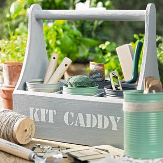 kit caddy with gardening tool