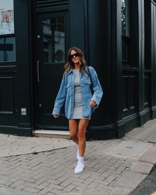 An image of influencer @kimturkington_ wearing a dress with trainers.