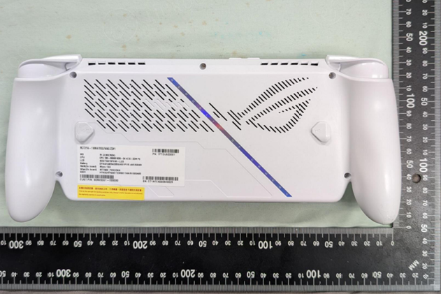 Photographs of an Asus ROG handheld gaming PC taken from FCC filings, showing the device's dimensions, new design, and button and port layout.