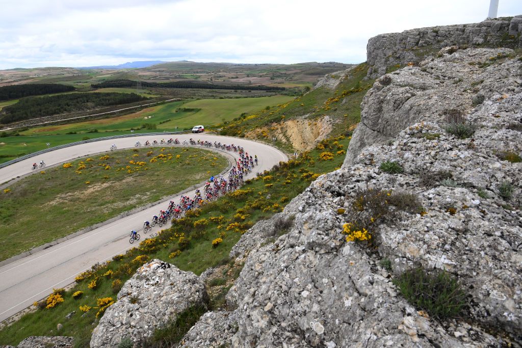 BURGOS SPAIN MAY 16 A general view of the peloton passing through a landscape during the 9th Vuelta a Burgos Feminas 2024 Stage 1 a 123km stage from Villagonzalo Pedernales to Burgos UCIWWT on May 16 2024 in Burgos Spain Photo by Alex BroadwayGetty Images