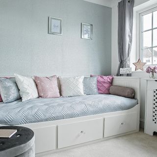bedroom with quirky bed shimmer and cushions